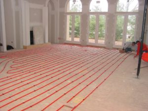 PEX tubing used in a hydronic (warm-water) radiant heating system.